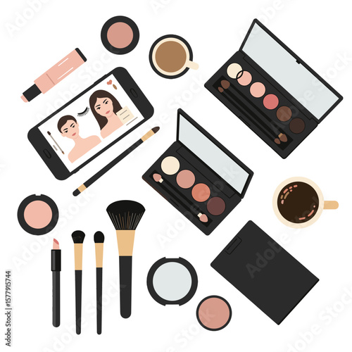 Overhead view of makeup products including brushes, palettes, and a phone showing a tutorial, with coffee