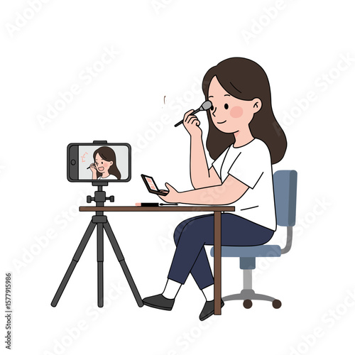 A young woman applying makeup while recording a video of herself using a smartphone on a tripod stand