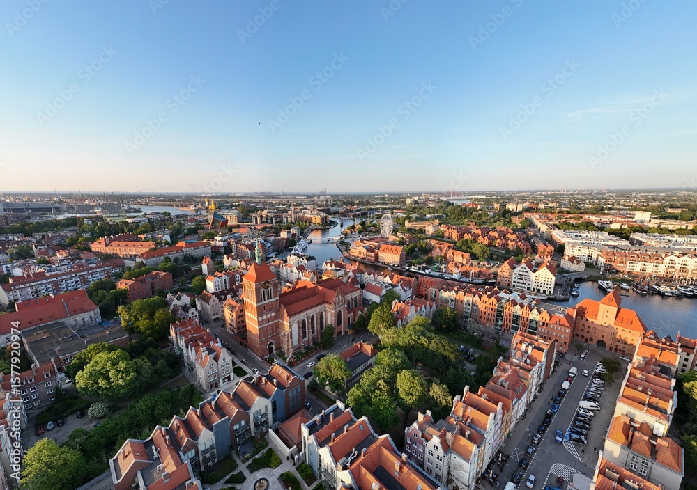 Naklejka premium Aerial photo taken by drone over the historic tourist center of Gdansk, the city hall and the cathedral on a summer day, Poland, Europe