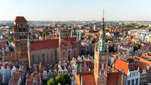 Aerial photo taken by drone over the historic tourist center of Gdansk, the city hall and the cathedral on a summer day, Poland, Europe
