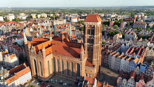 Aerial photo taken by drone over the historic tourist center of Gdansk, the city hall and the cathedral on a summer day, Poland, Europe
