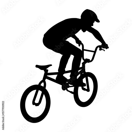 BMX rider performing a stunt in silhouette against white background  