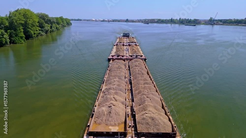 Transporting goods on the Danube River in Smederevo Serbia showcasing large cargo barges