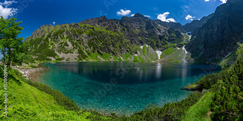 Fototapeta Naklejka Na Ścianę i Meble -  Panorama of Czarny Staw pod Rysami, a mountain lake in the Tatra Mountains in Zakopane, Poland