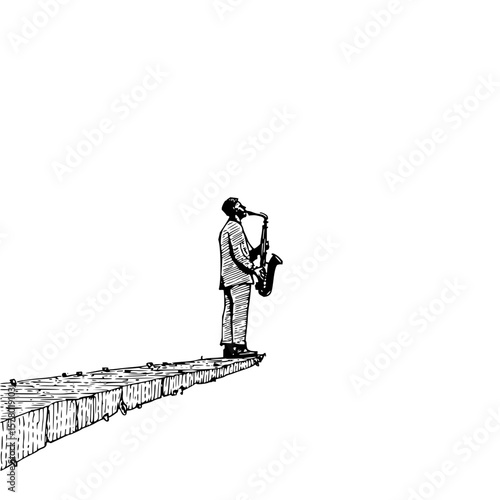 A man in a suit playing the saxophone while standing on the edge of a wooden platform in black and white