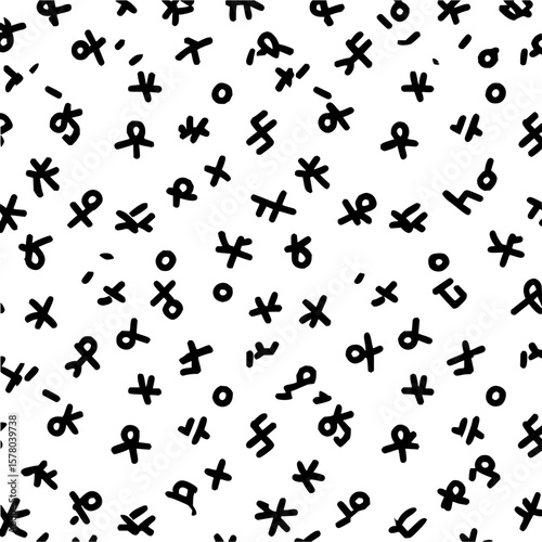 Seamless pattern of hand drawn black abstract shapes on a white background scattered randomly across the surface