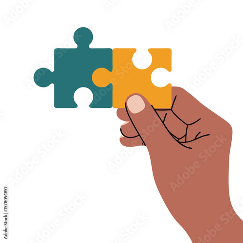 A hand holds two interlocking puzzle pieces against a white background.