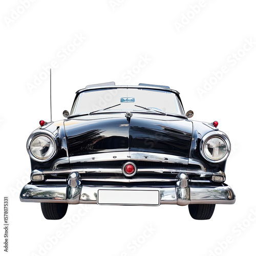 Sleek black vintage car, front view, chrome grill, round headlights, red emblem, antenna