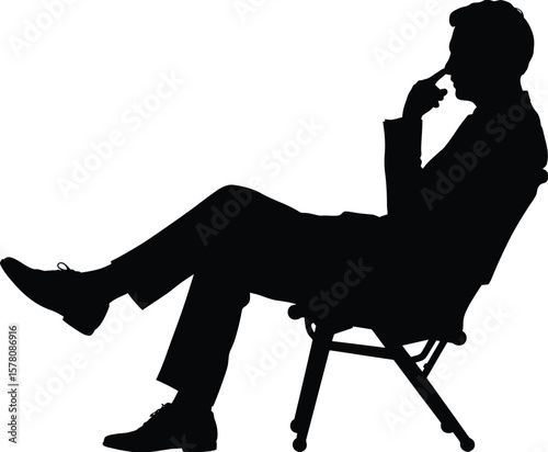 Engaged Man Thinking: Seated Silhouette Reflecting and Contemplating.

