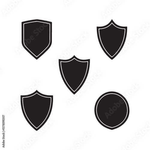 Collection of five black shield icons isolated on white background