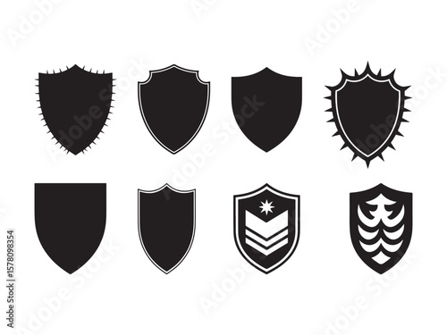 Collection of eight diverse shield icons and symbols isolated on white background