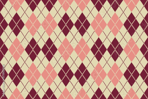 Seamless argyle pattern in pink, cream, and burgundy hues offers a stylish, classic, and versatile fabric or textile design.