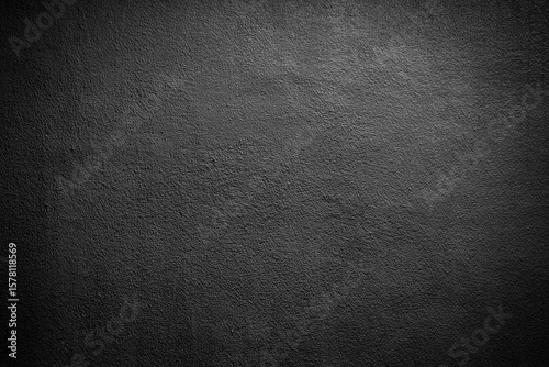 Dark grey or black cement wall on background