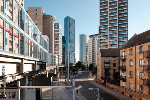 Photography Elevated train tracks passing through modern cityscape in london, uk