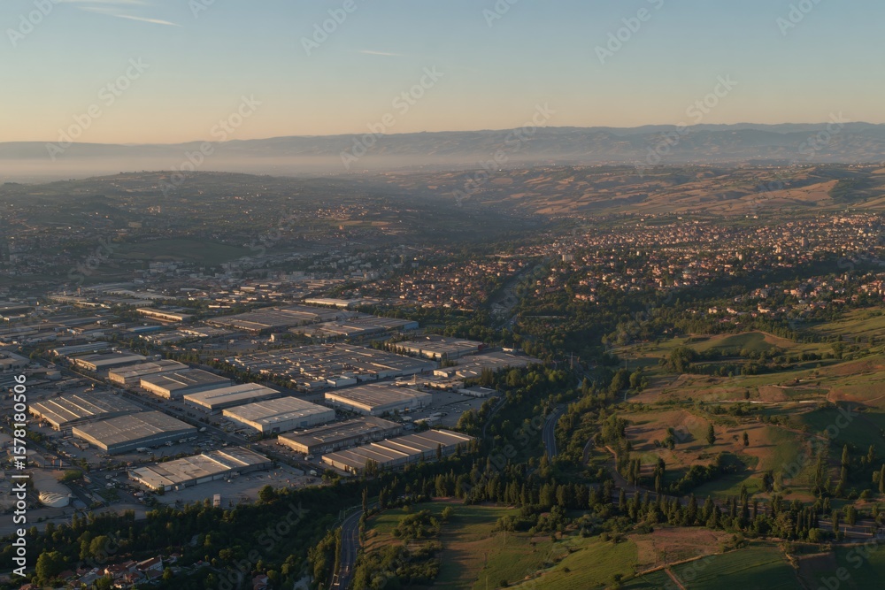 Obraz premium Aerial View of Industrial Area and Green Landscape Early Morning Photography Urban Environment Scenic Perspective