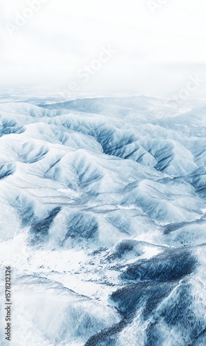 Winter aerial view over snowy mountains
