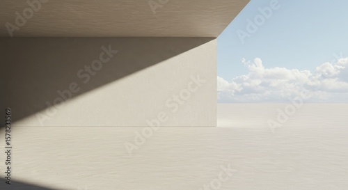 A minimalist, light-filled architectural space. A beige, modern interior with a view of a bright sky