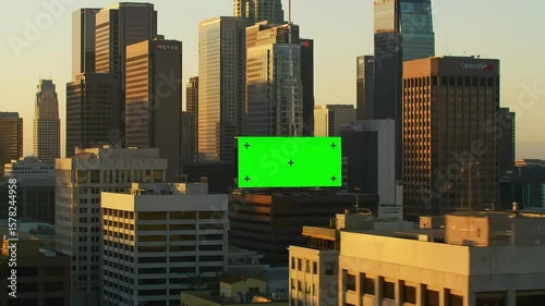 Aerial View of Downtown Los Angeles with Skyscrapers, Highways, and Green Screen Billboards for Chroma Key Advertising Mockups
