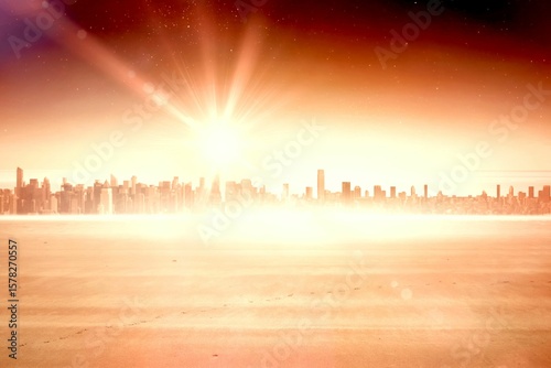 Distant city skyline is shining under sun rays across sandy plain with lens flare, flat design