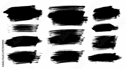 Artistic black brush strokes on a white background convey bold design elements