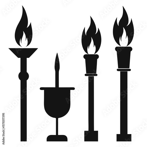 Black silhouettes of four torches with flames fire