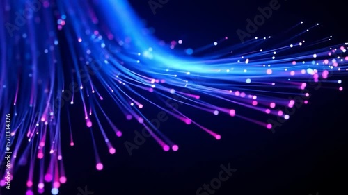 Swirling blue light streams with pink accents on dark backdrop