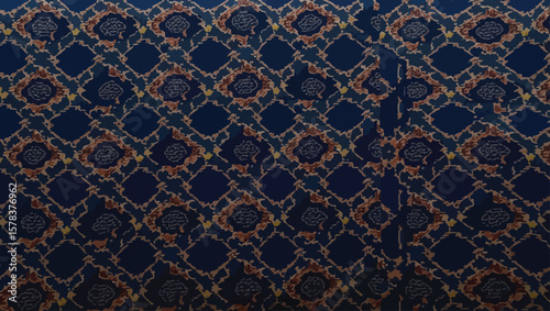 Hand loomed Yakan fabrics Weaving Filipino, Intricate pattern in deep blue and gold creates an elegant background texture for design applications with rich detail.