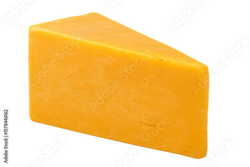 Sharp cheddar cheese wedge resting against clean white surface, showcasing crisp golden color and textured dairy profile