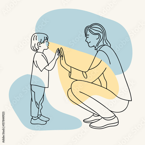 an adult squatted down in front of the child and sits on the same level with him and says something to him



