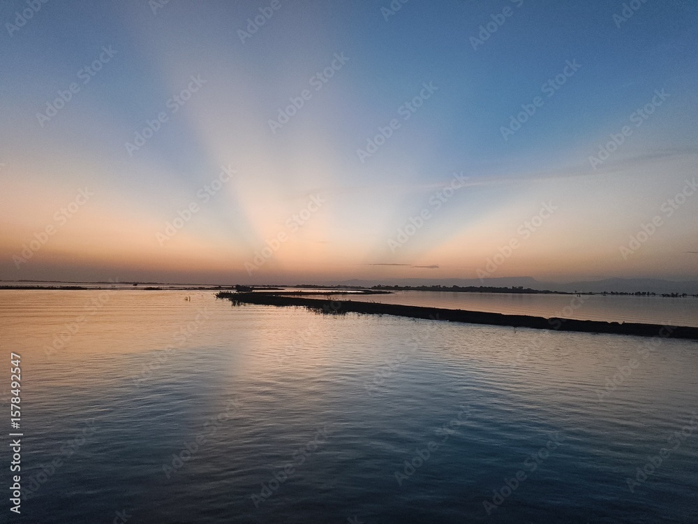 Obraz premium sunset over the river