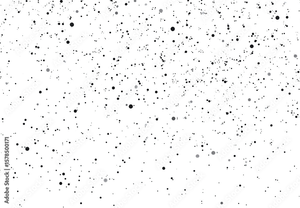 Obraz premium A speckled black and transparent background texture with a random dot pattern