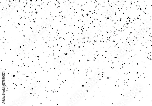 A speckled black and transparent background texture with a random dot pattern