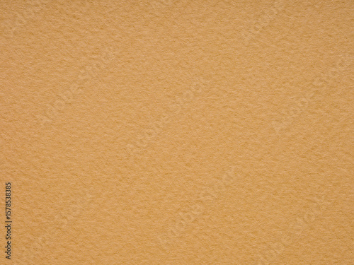 This golden paper texture radiates warmth, like a cozy sunbeam on a crisp autumn day
