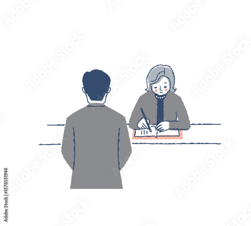  芳名帳に名前を書く弔問客の女性