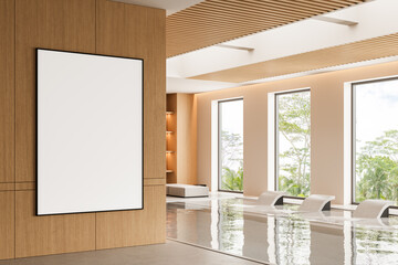 Blank framed poster mockup in modern spa interior with wood panel wall and poolside lounge chairs in natural daylight backdrop. 3D Rendering