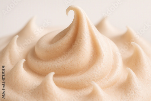 Billowy Vanilla Whipped Mousse Forming Delicate Peaks in Close-Up Dessert Composition