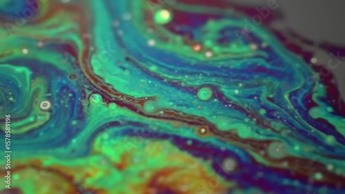 Abstract colorful fluid art with vibrant swirls and patterns in macro close up