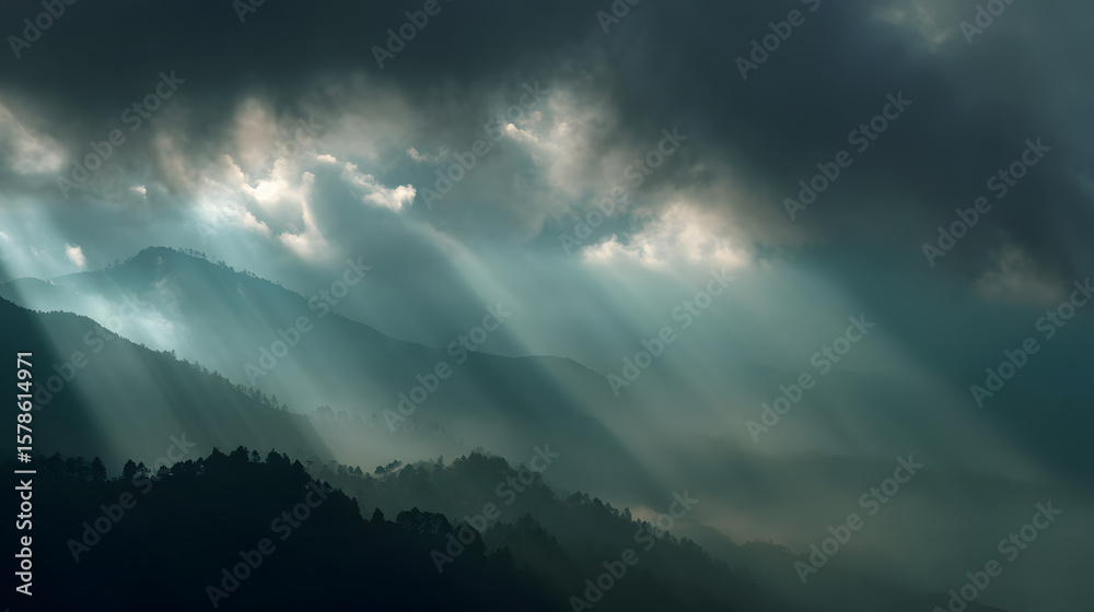 Fototapeta premium Ethereal Sun Rays Piercing Through Dark Clouds Over Layered Mountain Ranges and Misty Forests
