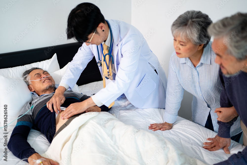 Obraz premium scene of doctor checking bedridden patient's stomach. illness senior man with infectious disease. home caregiver nurse visit retire couple for health check up recovery process medical service