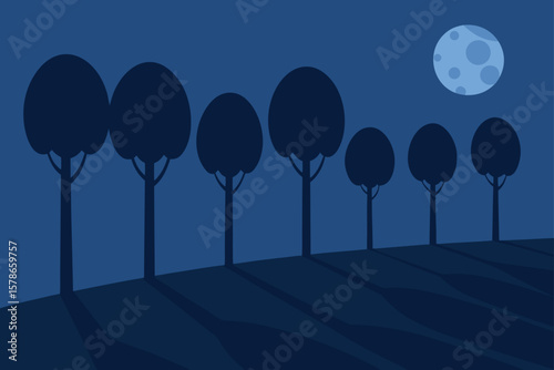 trees casting long shadows in the moonlight