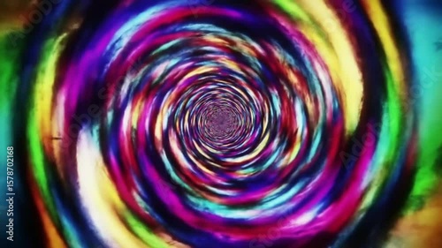 Colorful abstract spiral tunnel with swirling psychedelic rainbow patterns and motion