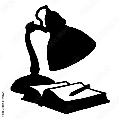 Silhouette of study lamp over notebook, night study dedication