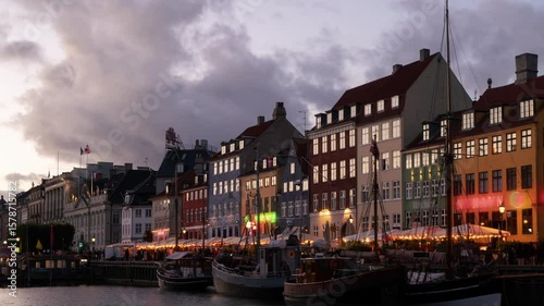 Colorful timelapse of Copenhagen's iconic Nyhavn harbor during dusk