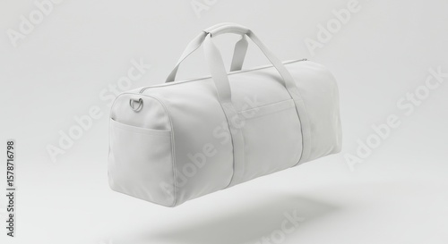Minimalist white duffel bag floating against a clean white background with soft shadows