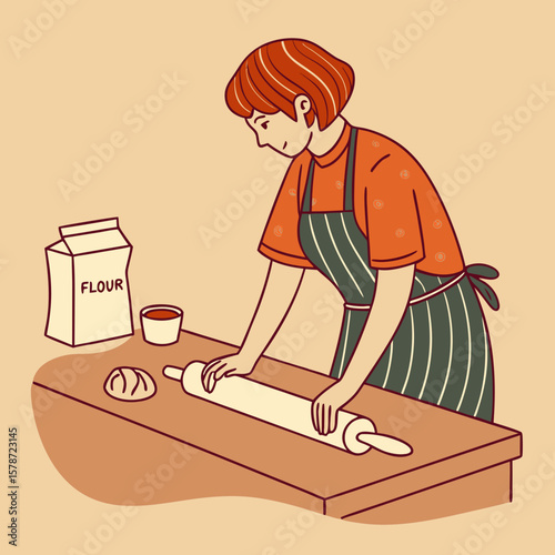 
a woman rolling a rolling pin