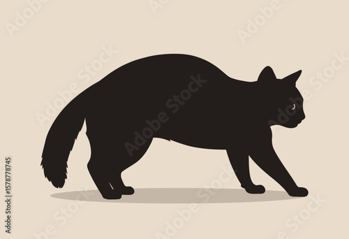 Black cat silhouette walking on a soft beige background  