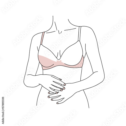 Woman wearing a pink bra with hands on her waist for Bra Day  