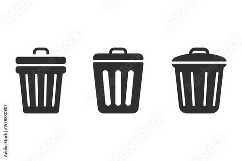 Three black garbage cans with lids in a row on a white background image