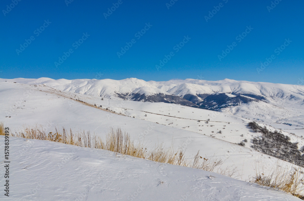 Obraz premium snow covered slopes of Aytsasar mountain from Jermuk ropeway upper station (Vayots Dzor,. Armenia)