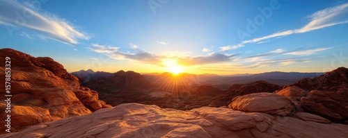 Scenic sunrise over red rock mountains